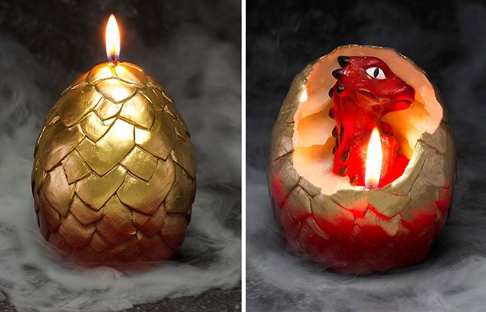 Candela uovo di drago che si schiude mentre si scioglie